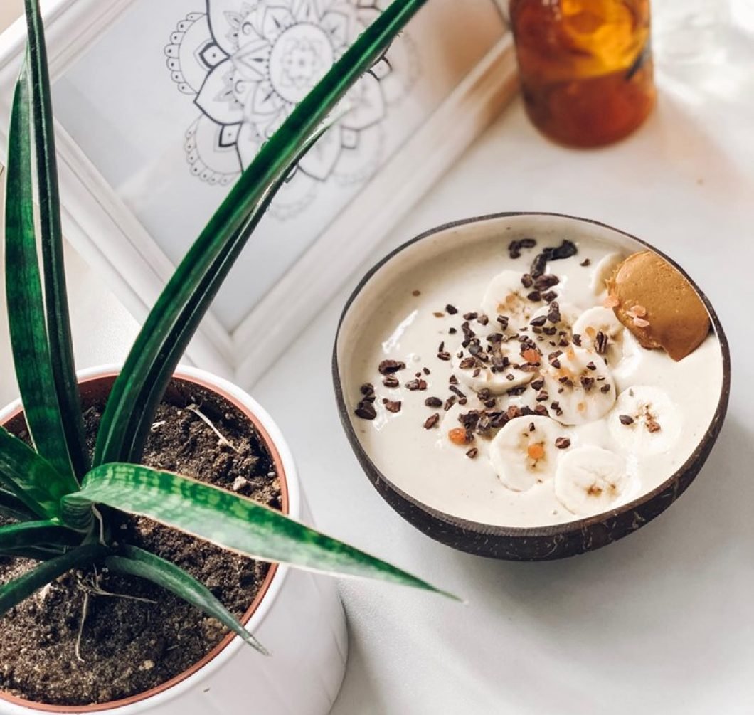 A Sustainable Coconut Bowl with a white lacquer